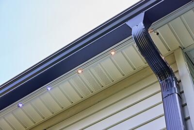 Installing permanent outdoor lighting by Bright Brothers of Space City