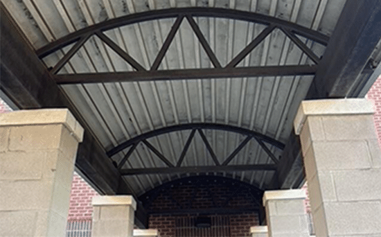 Parking lot before soft washing Parking lot before washing in Houston, TX