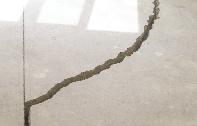 How to Repair a Cracked, Sinking Concrete Floor