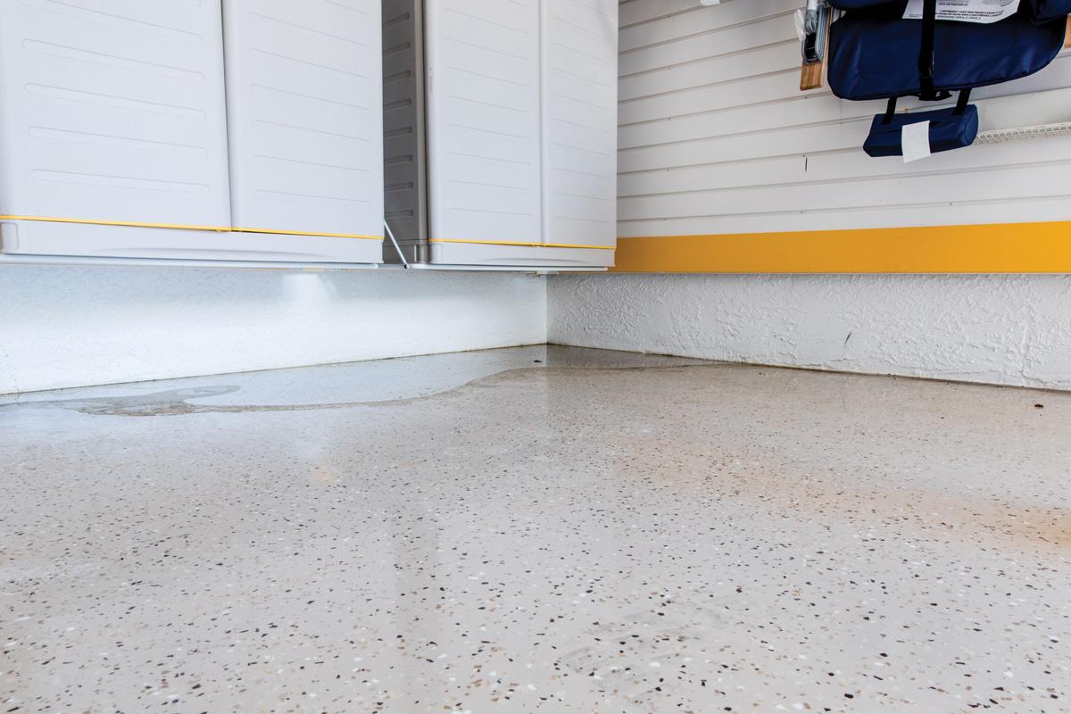 sloping garage floor water pooling