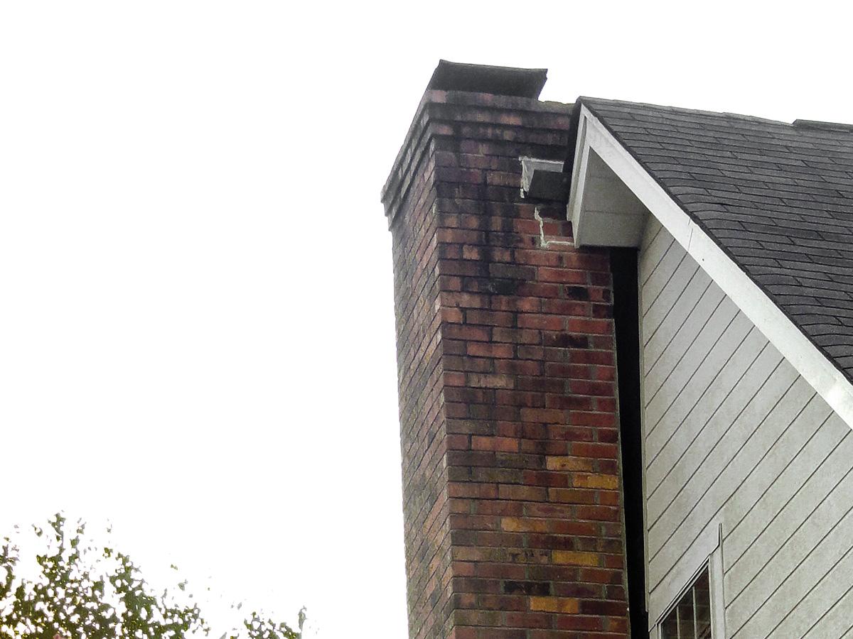 Leaning brick chimney