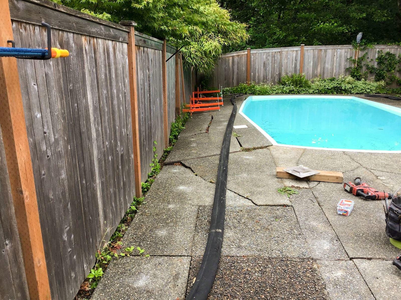 Broken concrete around pool