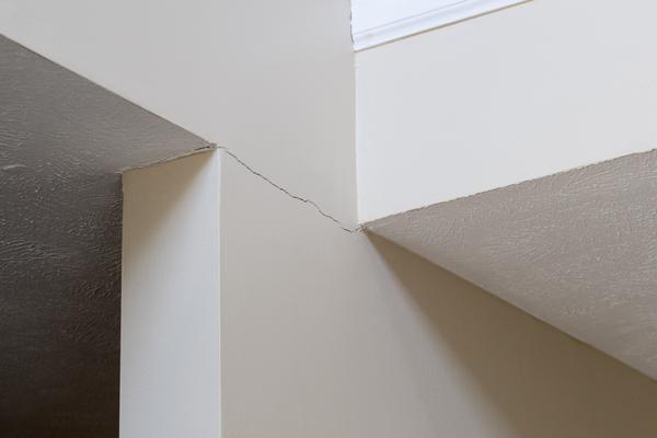 Interior wall cracks due to settling foundation