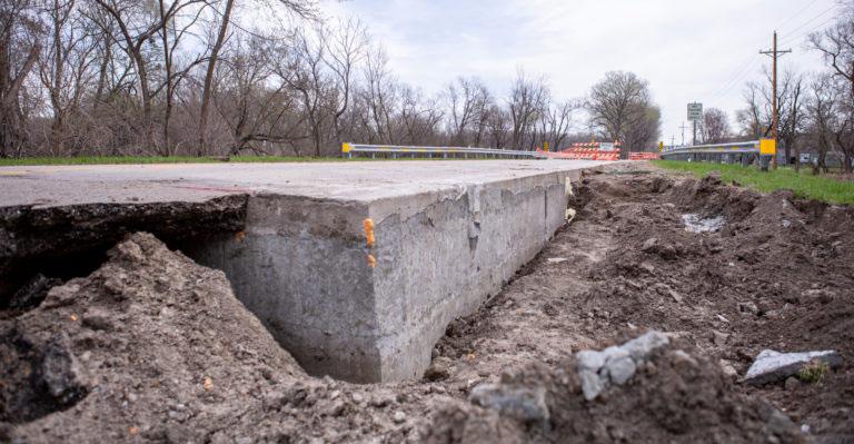 low density cellular concrete supporting flood damaged road