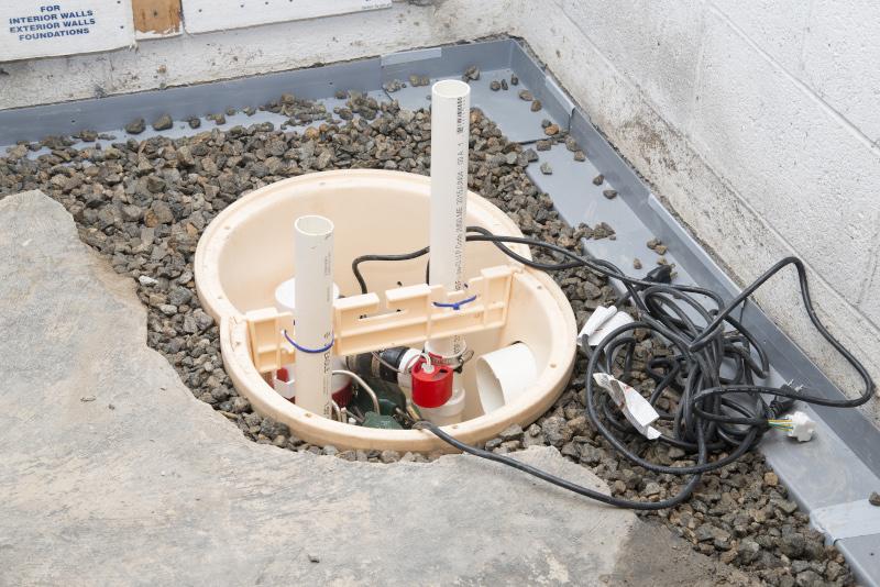 Installing a sump in a sump pump liner in a Wichita home