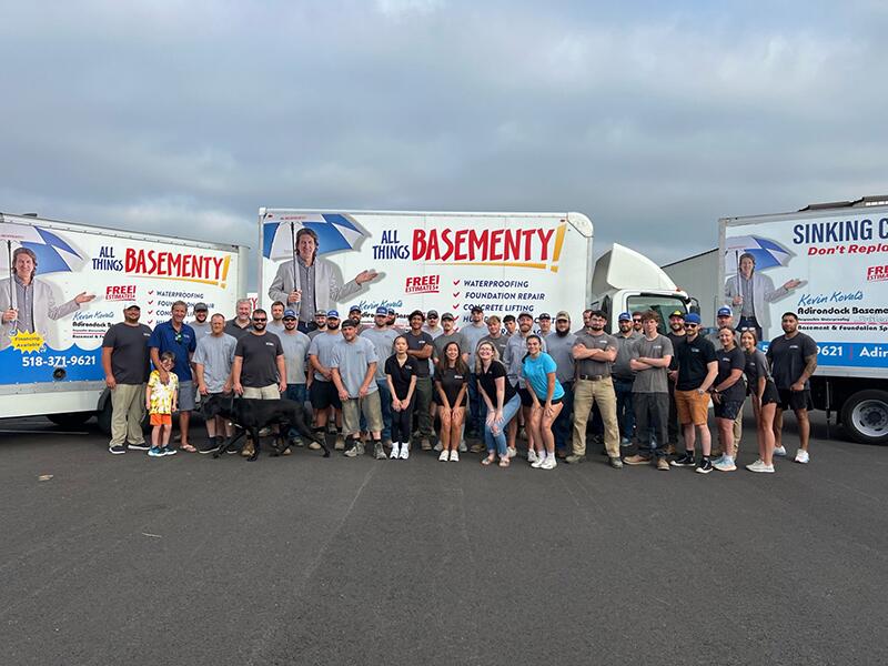 Adirondack Basement Systems employees and trucks