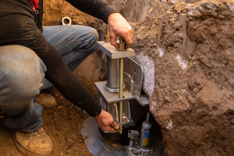 Foundation push pier installation