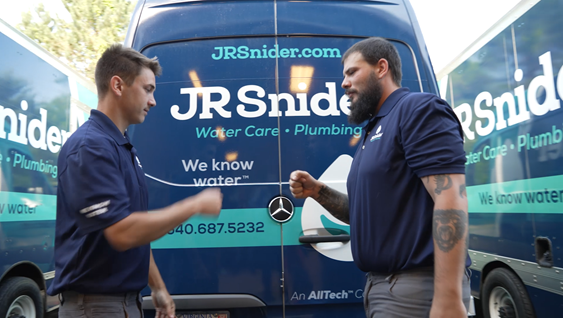 Our team standing by a service van