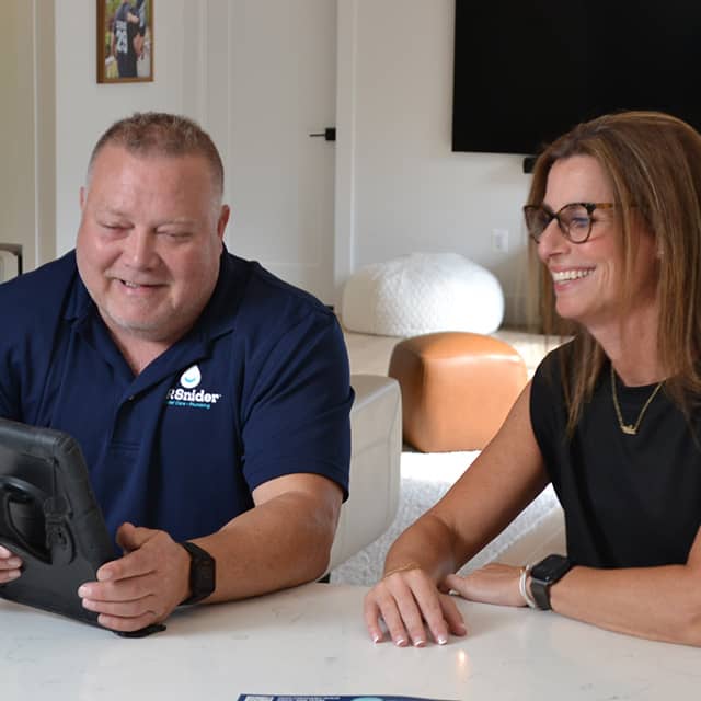 Friendly team discussing membership benefits