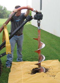 Contractor Installing Foundation Wall Anchors