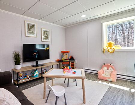 Egress windows offering natural light into the basement. 