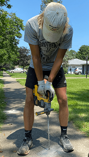 Leveling A Sinking Concrete Sidewalk in Lorain