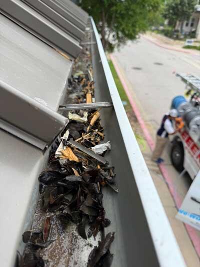 Gutter Cleaning Before in Houston, TX