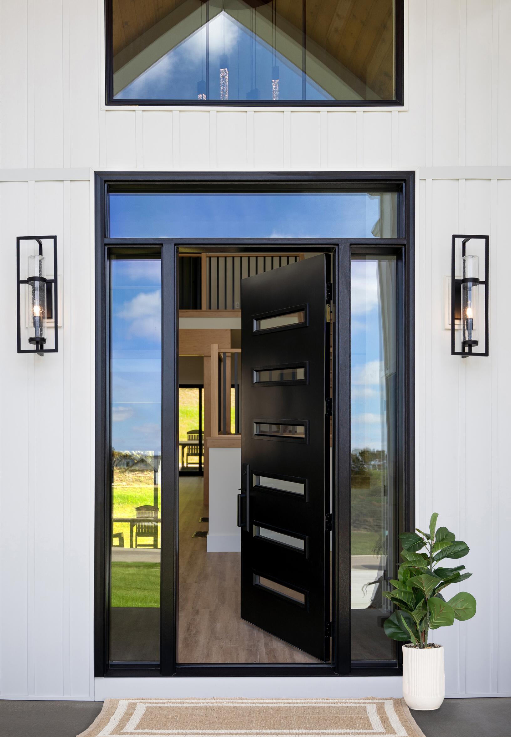 Coal black Legacy entry door with horizontal glass inserts, two sidelites and a transom