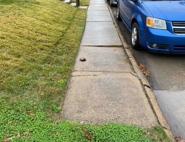 Sunken concrete sidewalk in Greater Chicago & Northwest Indiana