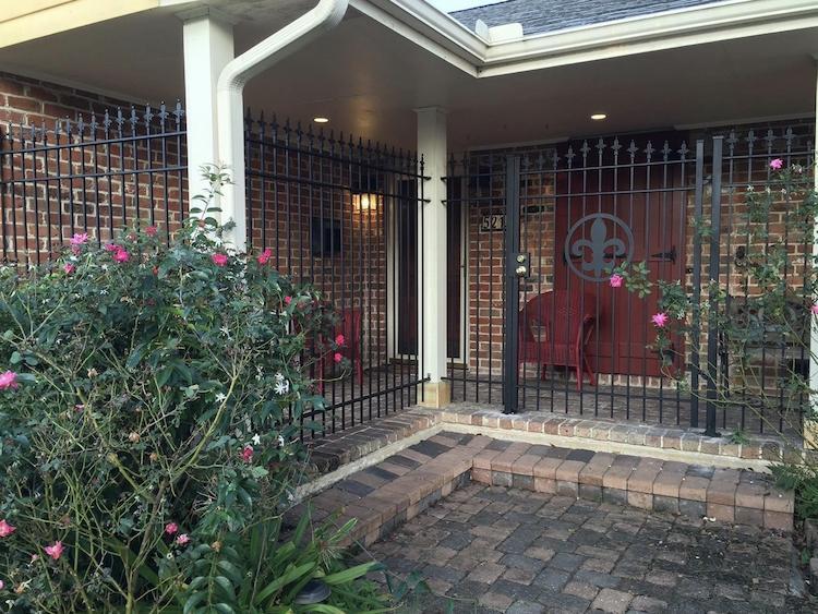 Beautiful beige iron fence in Metairie, Louisiana