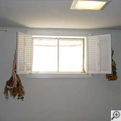 An energy efficient double-paned window installed in a basement.