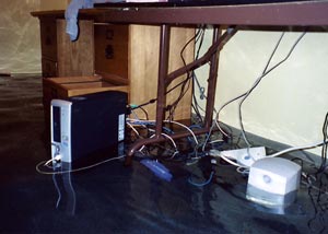 a computer system that has been destroyed in a basement flood