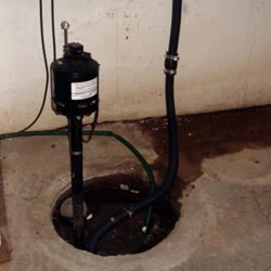 A pedestal sump pump system in a basement