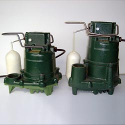 two submersible cast-iron Zoeller sump pumps