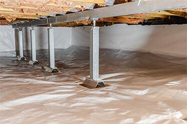 A crawl space support system repairing a sagging structure.