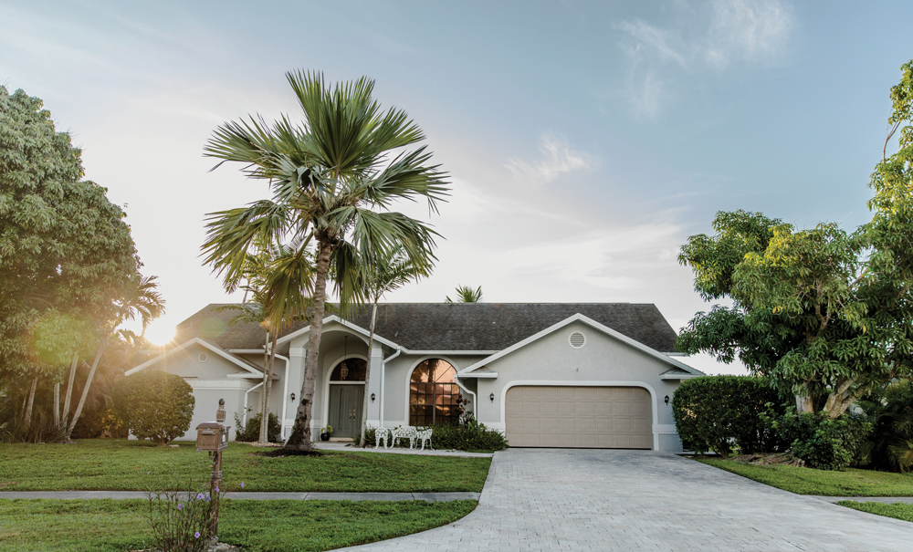 Happy homeowner with dry yard