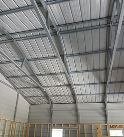 Spray foam applied to roof in commercial building