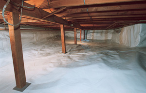 a crawl space liner installed in a damp crawl space in Grand Junction