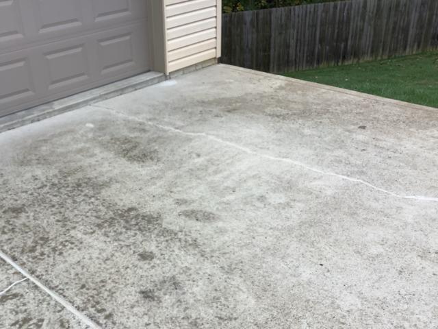 Level driveway slab at the garage entrance after concrete leveling in Chicagoland