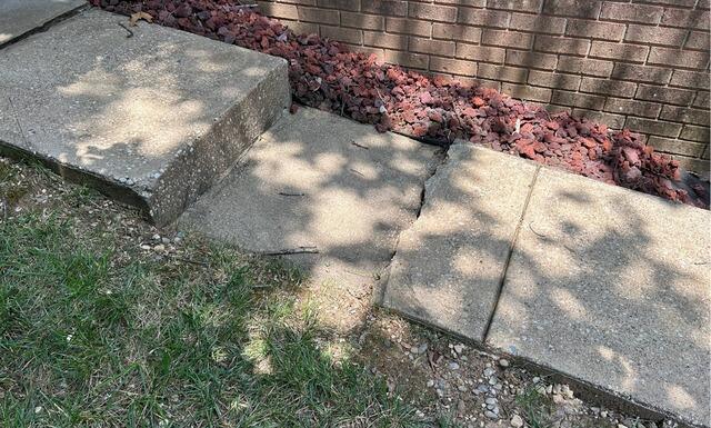 Sunken walkway slab pulling away from the front steps in Greater Chicago & Northwest Indiana