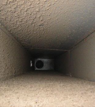 dust-covered air duct system in Sergeant Bluff