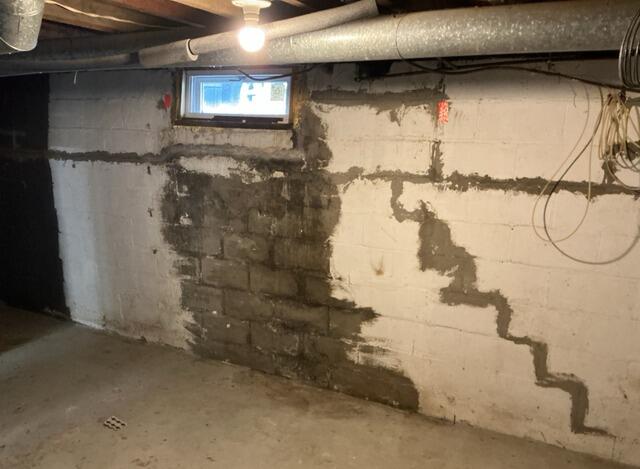 PowerBrace Installation For Foundation Support in South Glens Falls, NY - Before Photo