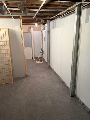 Basement Waterproofing and Flooring Installation in Rensselaer, NY - After Photo
