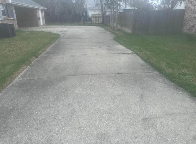 Cracking Driveway in Waveland, MS - Before Photo