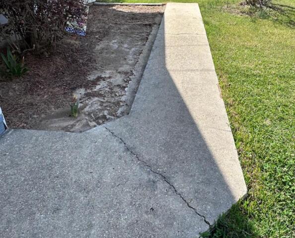 Cracking Concrete Walkway in Bogue Chitto, MS - Before Photo