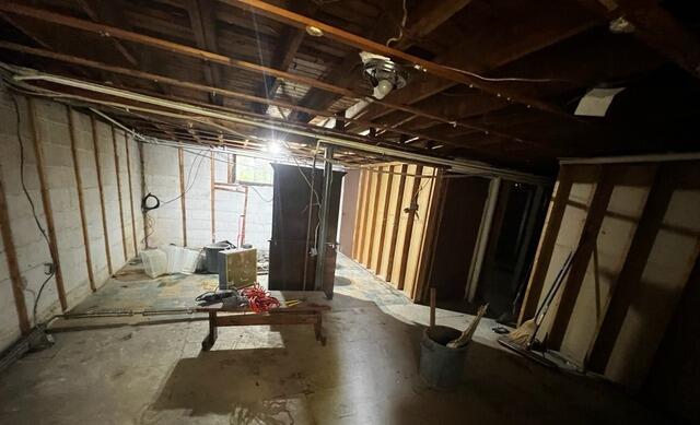 Basement Flooring Installed in West Babylon, New York - Before Photo