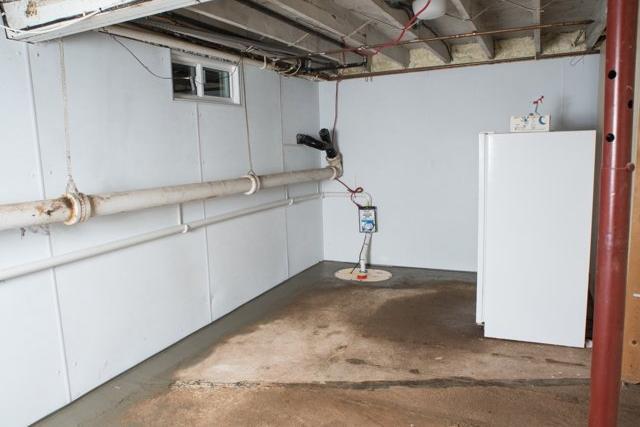 Damp Cluttered Basement in Medford NY - After Photo