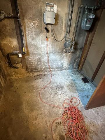 Basement Moisture Control System in Massapequa, NY - Before Photo