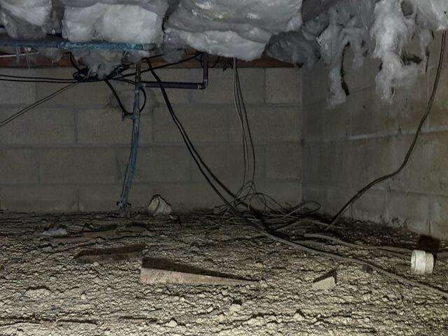 Crawlspace Encapsulation & Moisture Control in Amityville, NY - Before Photo