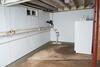 Damp Cluttered Basement in Medford NY