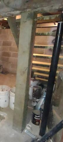 From Sagging Floors to Structural Stability - Before Photo