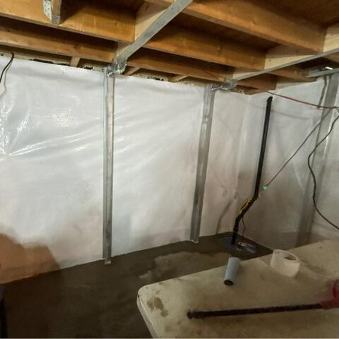 Foundation wall stabilized against hydrostatic pressure and cracks in Saint-Camille-de-Lellis, QC - After Photo