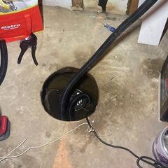 Installing Our SuperSump System inside a basement in La-Visitation-De-Yamaska, Quebec