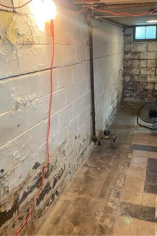 Bowing Wall Repair in Rock Island, IL - Before Photo
