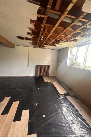 Newhall, IA Floor Stabilization - Before Photo