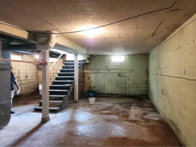 Bowing Wall Repair in Bettendorf, IA - Before Photo