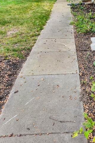 Sidewalk Repair in Vinton, IA - Before Photo