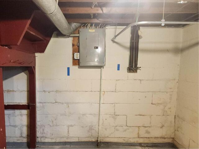 Bowing Wall Repair in Moline, IL - Before Photo