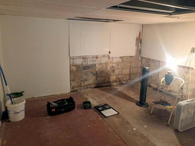 East Moline, IL Complete Basement Waterproofing - Before Photo