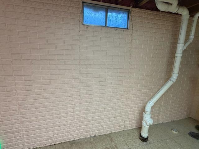 Foundation Support and Basement Waterproofing in Bettendorf, IA - Before Photo